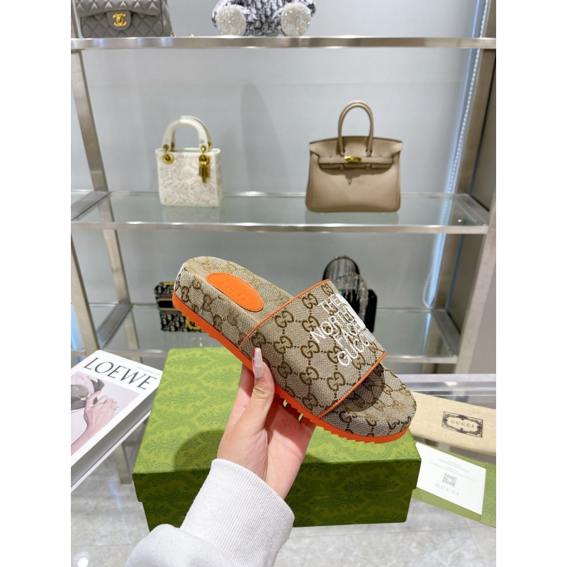 G*u*i slippers